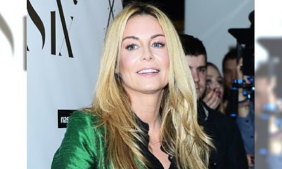 Małgorzata Rozenek-Majdan w zielonym BŁYSZCZĄCYM garniturze. "Jak elf". Hit czy kit?