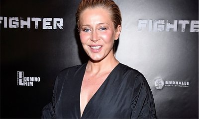Katarzyna Warnke z olbrzymim brzuchem na premierze filmu "Fighter"