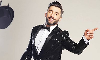 Rafał Maserak opublikował swoje stare zdjęcie. Fanki zachwycone jego włosami "Ale fryzura!"