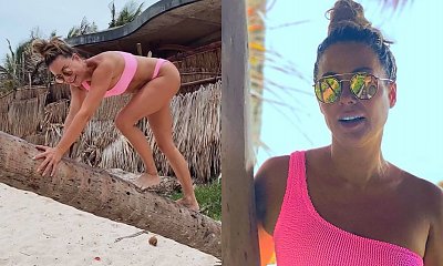 Małgorzata Rozenek w różowym bikini wspina się na drzewo! Znamy cenę i markę kostiumu