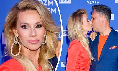 Ramówka TVP: Małgorzata Opczowska w pomarańczowej sukience mini na ściance z mężem! Pasują do siebie?