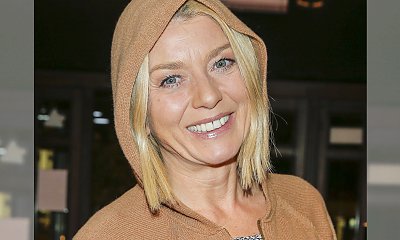 Edyta Olszówka w dresie i wężowych botkach na czerwonym dywanie. Udana stylizacja?