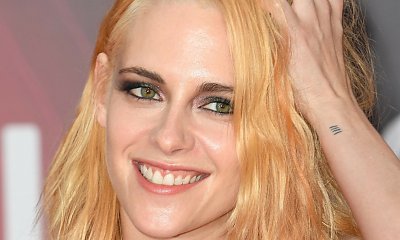 Kristen Stewart w żółtych włosach, smokey eyes i szarej sukni. "Wygląda niechlujnie!" - piszą internauci