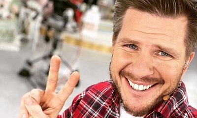 Filip Chajzer pozuje w dopasowanym, zielonym garniturze! "Wyglądasz jak ogórek lub groszek" - wyśmiewają się fani