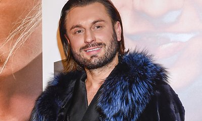 Rafał Grabias w szalonym zestawie i futrze bryluje na ściance. Zaskoczył butami?