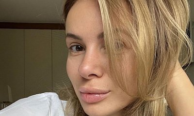 Izabela Janachowska zadaje szyku w krótkiej spódniczce w cętki, staniku z wielką kokardą i słomkowym kapeluszu. Taki outfit to hit tego lata?