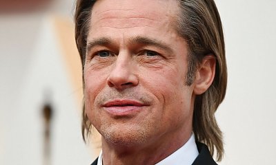Brad Pitt niczym groszek konserwowy prezentuje młodzieżową naturę na ściance. Kryzys wieku średniego?!