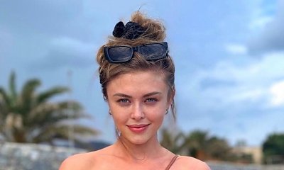 Joanna Opozda w czerwonej mini eksponuje nieziemsko długie nogi: "To tylko dobrze zrobione zdjęcie" - ktoś pisze