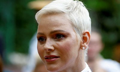 Księżna Charlene w białej bluzce z koronki i spodniach na pikniku w Monako. Udana stylizacja?