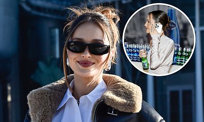 Marina Łuczenko robi miny do telefonu na pokazie Macieja Zienia. Do kogo się tak wdzięczy?