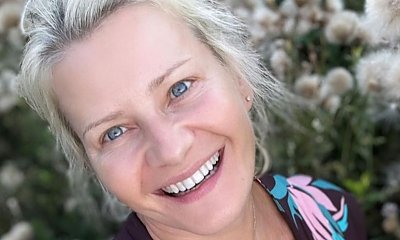 Małgorzata Kożuchowska pręży się przy basenie w czarnym bikini. Co za figura