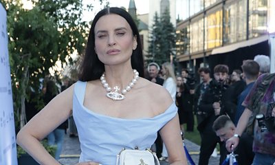 Joanna Horodyńska na pokazie Paprocki & Brzozowski. Jej dziwne ciżemki skradły show