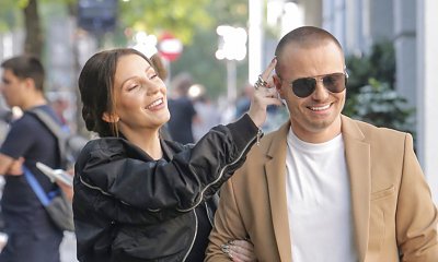 Dominika od Hakiela w ciążowej sesji jako jesieniara. Pozuje w tiulowej sukni otoczona liśćmi