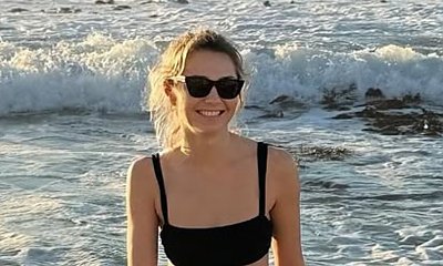 Małgorzata Socha wygina (nie)śmiało ciało nad oceanem. Tak wygląda brzuch 44-letniej mamy trójki [zdjęcia]