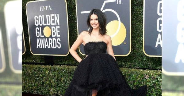 Złote Globy 2018: Kendall Jenner zachwyciła w tej kreacji, ale wszyscy patrzą na jej twarz
