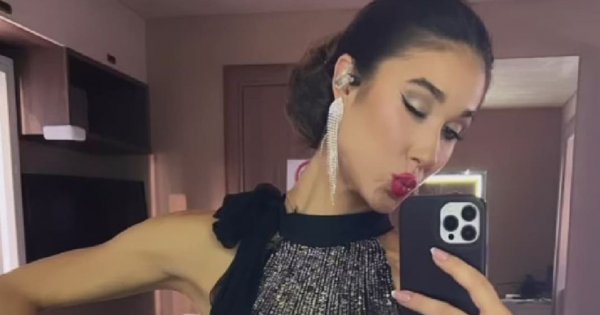 Ida Nowakowska w długiej czerwonej sukni z wstawką przy dekolcie. Udana stylizacja?