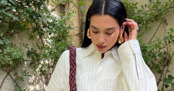 Dua Lipa w modnej mini i długich kozakach! Świetny pomysł na stylizację? "Ten outfit jest po prostu genialny!" - ktoś pisze