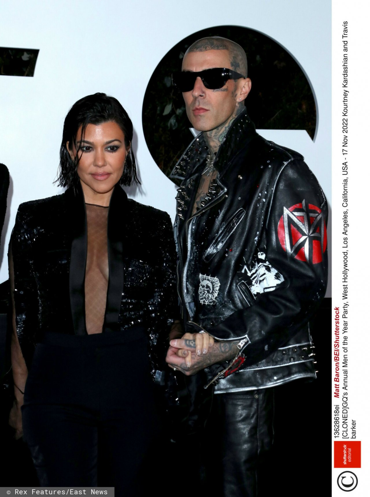 Kourtney Kardashian i Travis Baker na ściance podczas amerykańskiej impreza GQ Annual Men of the Year