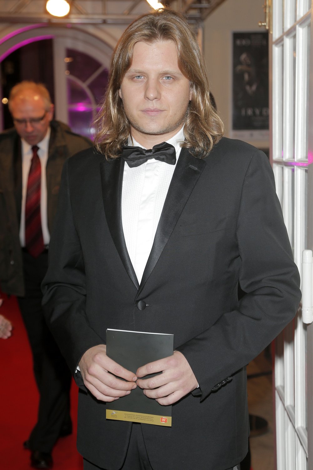 Piotr Woźniak-Starak w garniturze