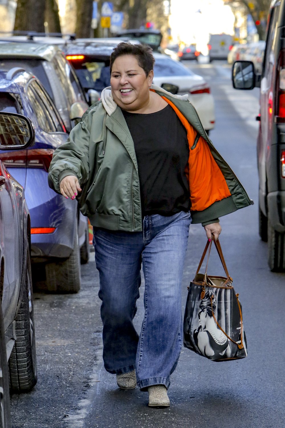 Dorota Wellman w zielonej kurtce