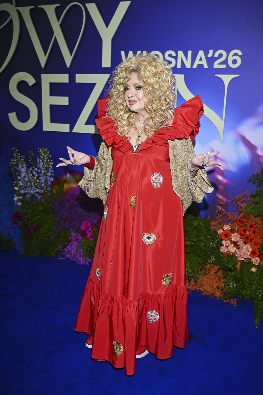 Magda Gessler w czerwonej sukni do ziemi