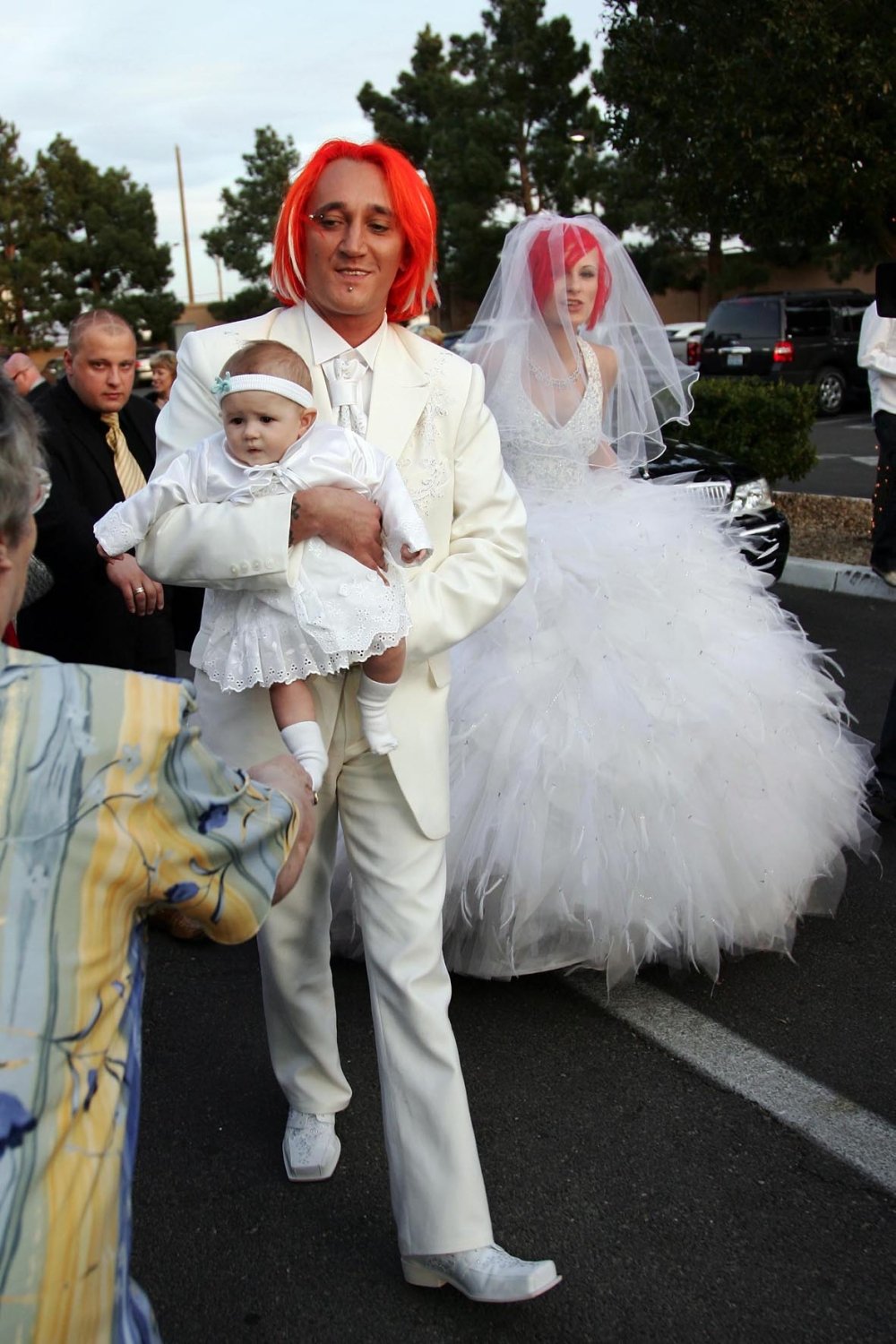 Michał WIśniewski z córką z żoną Anna Śiwątczka podczas ślubu