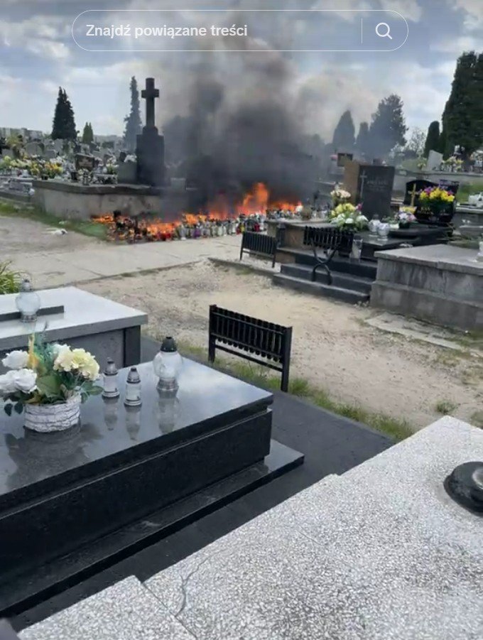widok płonącego grobu