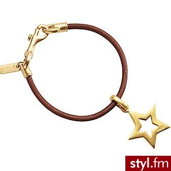 brązowy skórzany rzemyk z przewieszką w kształcie złotej gwiazdki. Firma Coach cena: 88$ - Pozostałe Dodatki Moda