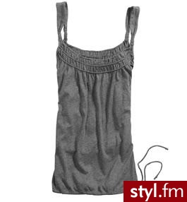 Śliczna bluzeczka z mozliwością regulowania u dołu. - Pozostałe Ciuchy Moda